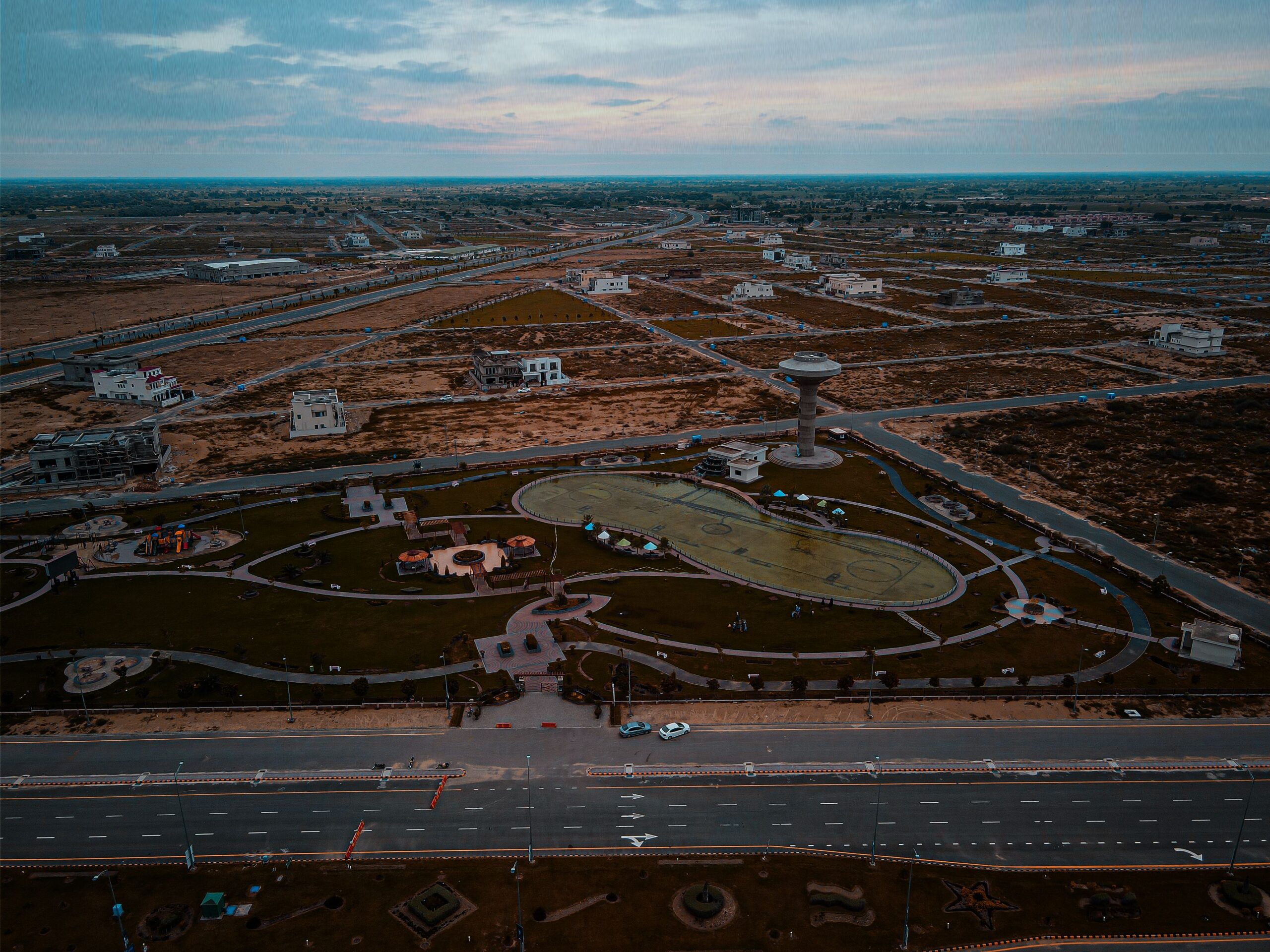 Aerial view of urban development and roads in Bahawalpur, Pakistan, showcasing infrastructure and open spaces.